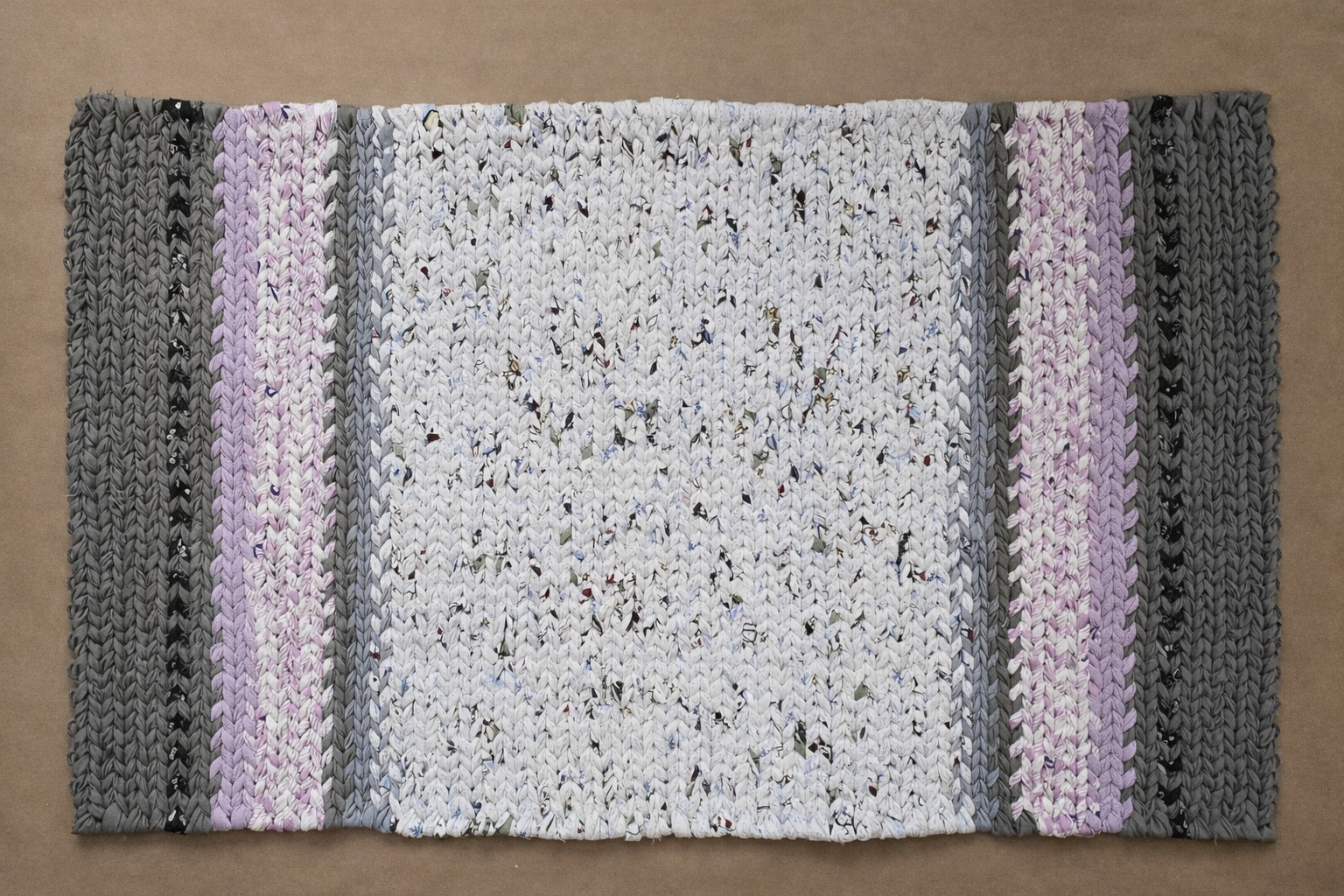 Lavender Ash hand-twined cotton rug full view with light neutral center and lavender and ash gray borders