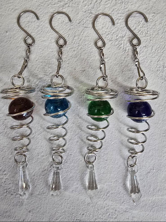 Set of four mini spiral orb suncatchers with colored glass marbles wrapped in silver spirals and clear prism drops