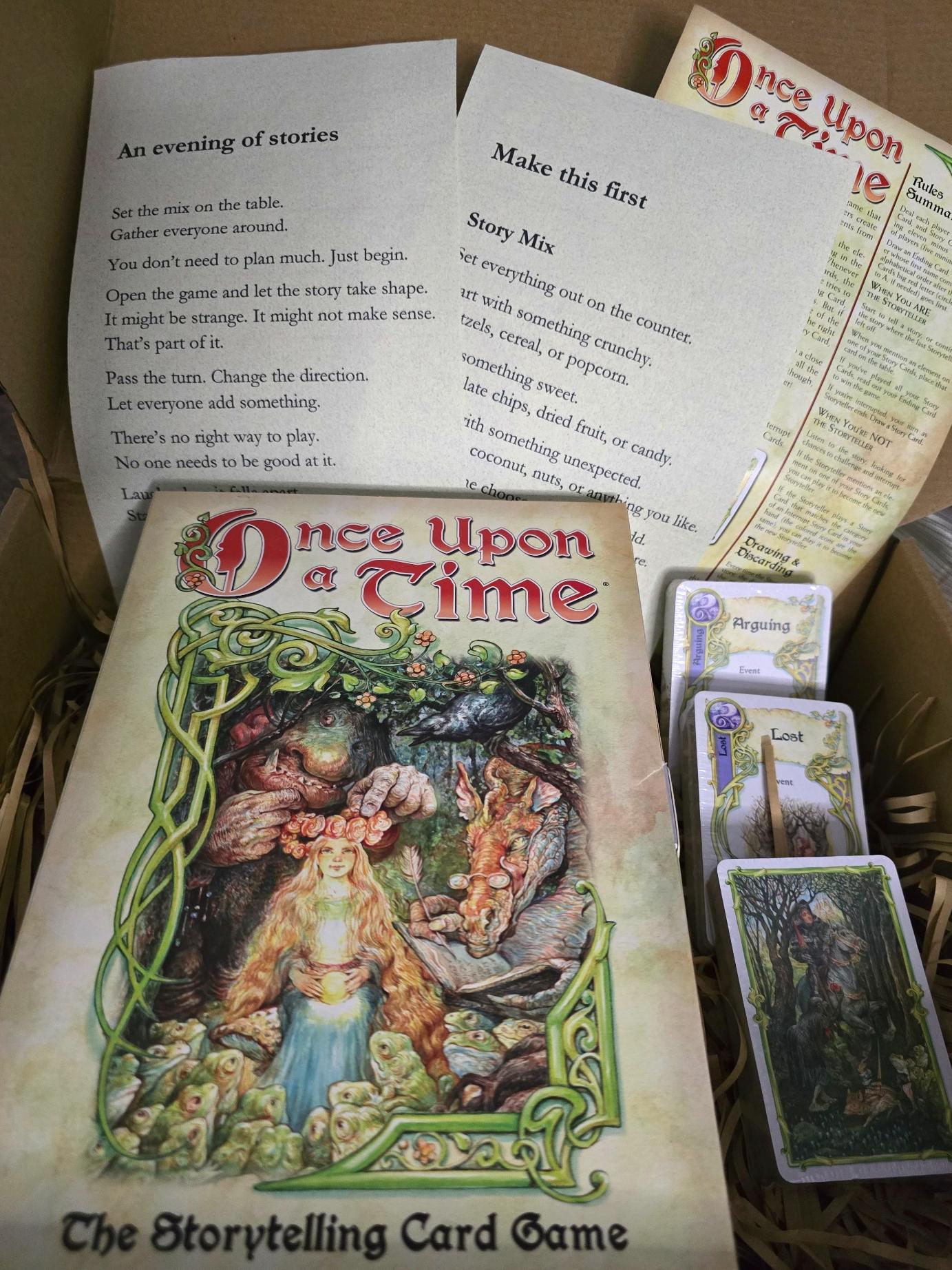 storytelling game night kit with Once Upon a Time card game, recipe card, host card